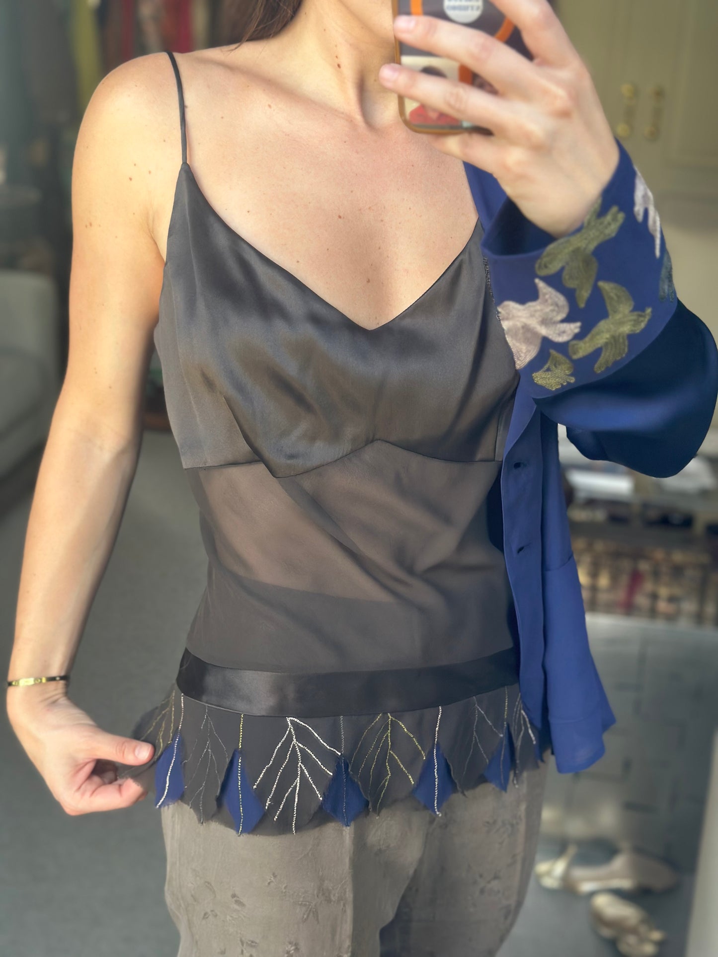 Top plumas con blusa seda