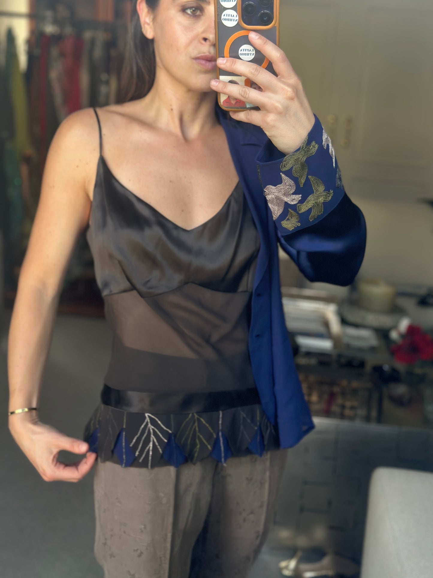 Top plumas con blusa seda