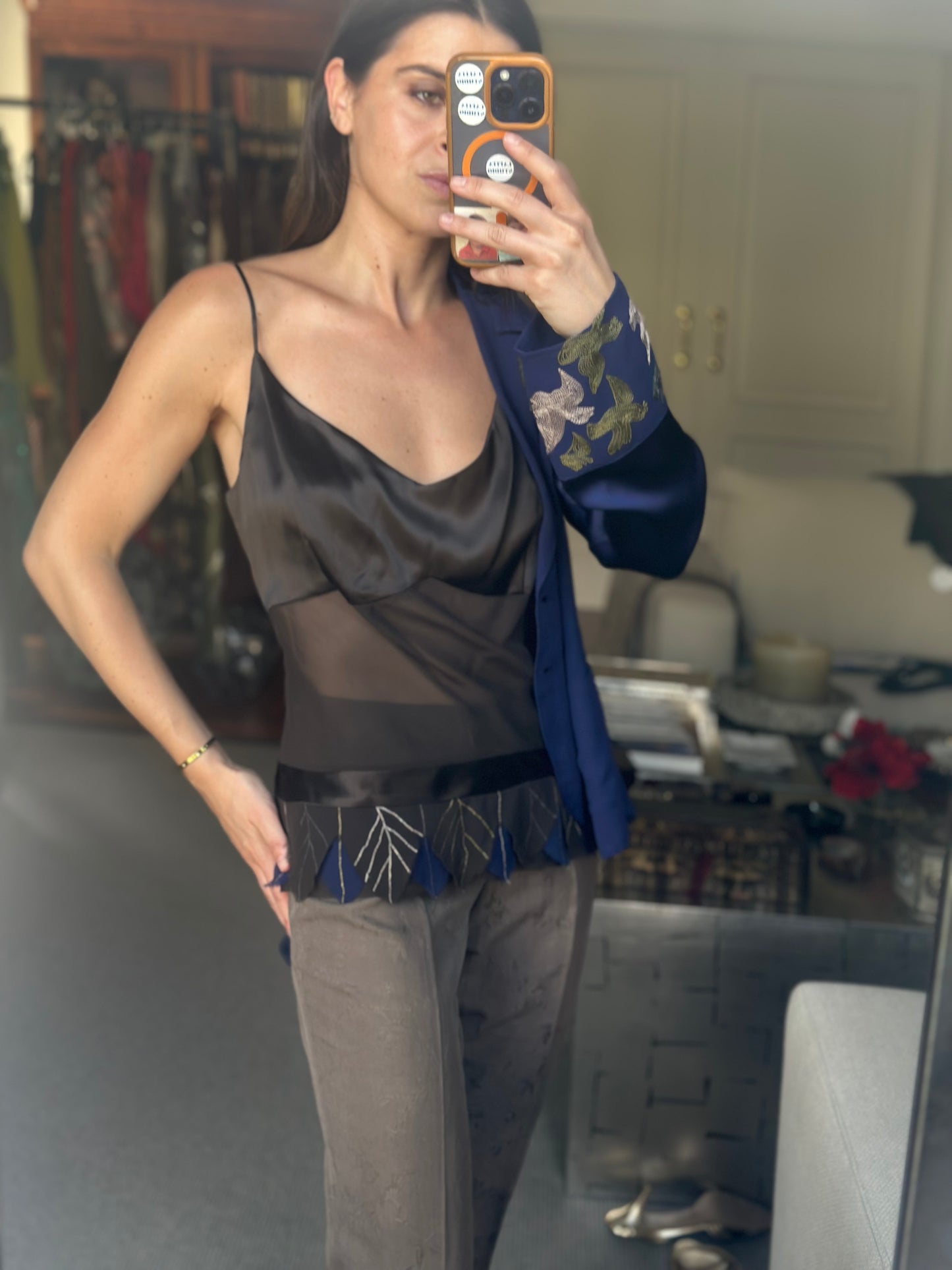 Top plumas con blusa seda